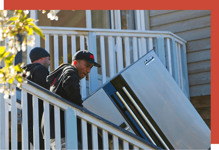 Removalists, moving furniture down a flight of stairs